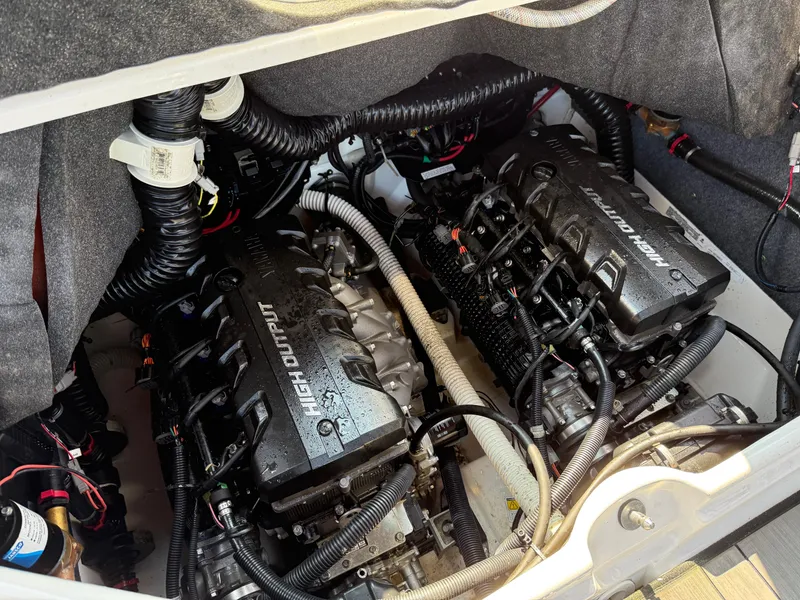 Slide: The Image of 2019 Yamaha Boats 242X E-Series engine compartment with twin high-output engines. - 27