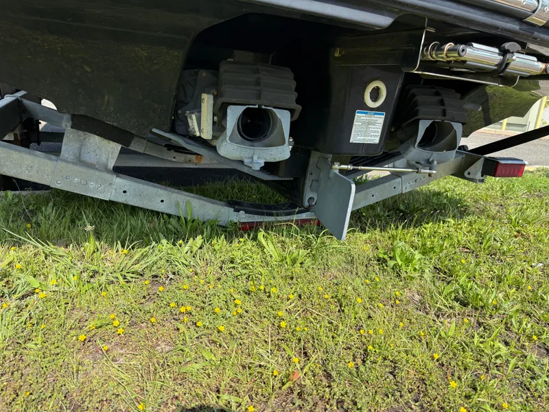 Slide: The Image of Rear view of a 2019 Yamaha Boats 242X E-Series on a trailer, showing dual jet nozzles. - 7