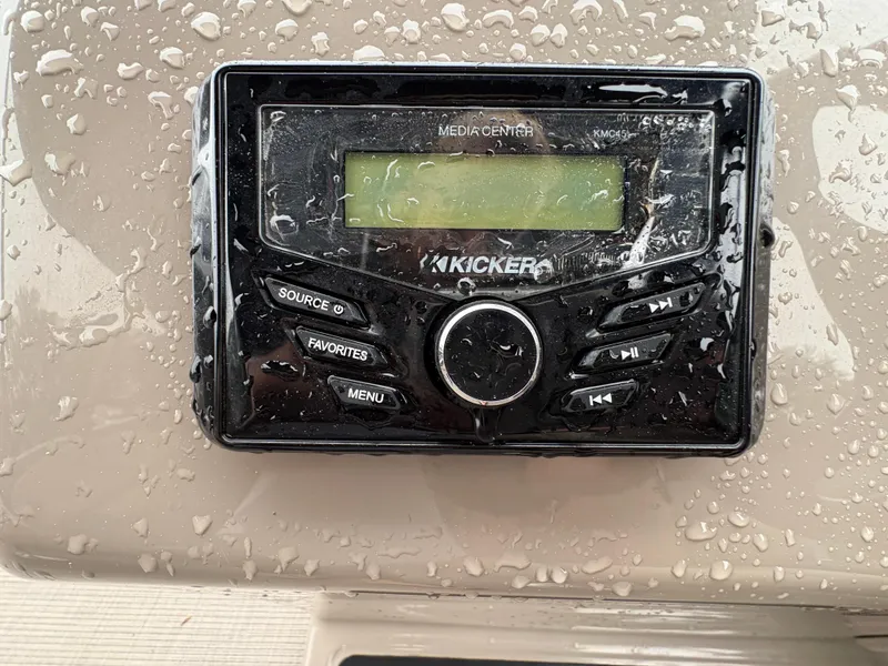 Slide: The Image of Wet Kicker media center on 2022 Sun Tracker PARTY BARGE boat dashboard. - 18