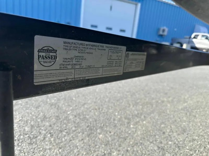Slide: The Image of Sticker on 2013 Nitro Z7 18' trailer, showing manufacturing details and certification. - 13