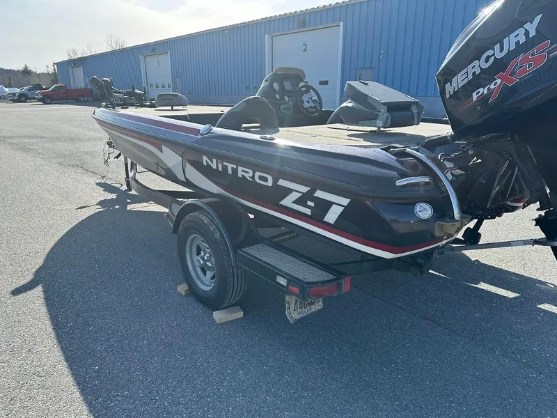 Slide: The Image of 2013 Nitro Z7 18' boat with Mercury Pro XS engine, parked outdoors. - 5