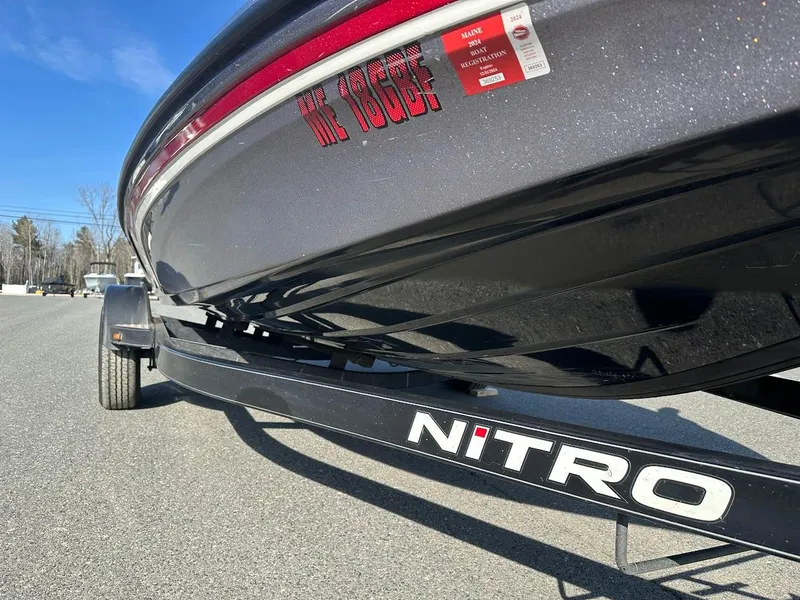 Slide: The Image of 2013 Nitro Z7 18' boat on trailer, close-up view, outdoors. - 8