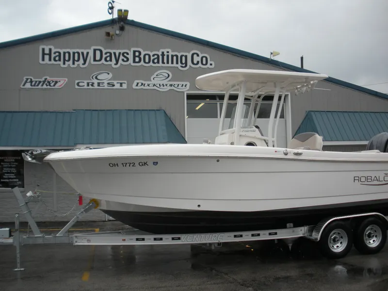 The Image of 2022 Robalo R242 Center Console boat on trailer at Happy Days Boating Co. - 1
