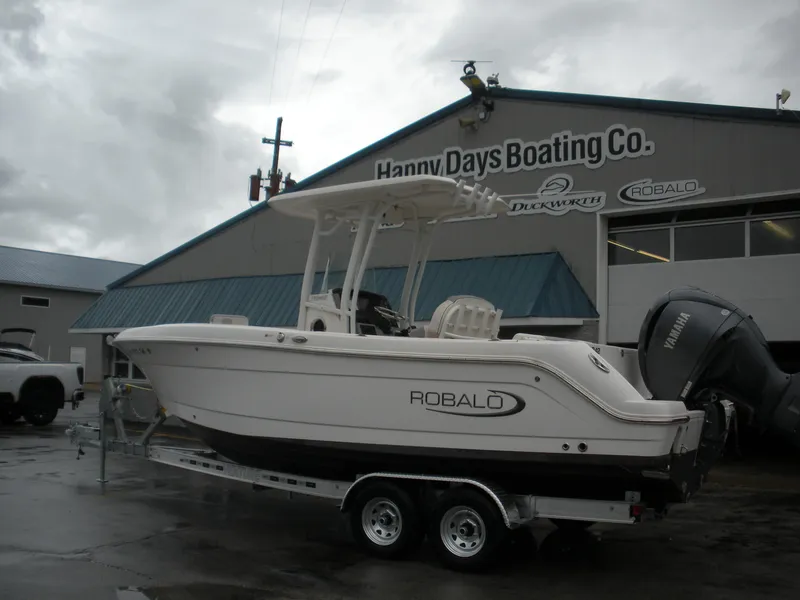 Slide: The Image of 2022 Robalo R242 Center Console boat on trailer at Happy Days Boating Co. - 3