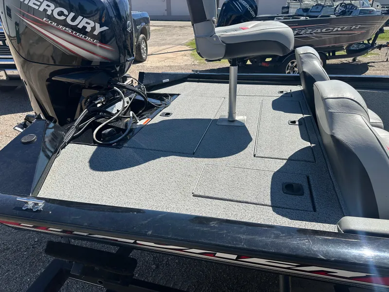 Slide: The Image of 2017 Tracker Pro Team 175 TXW boat with Mercury engine and seating. - 15