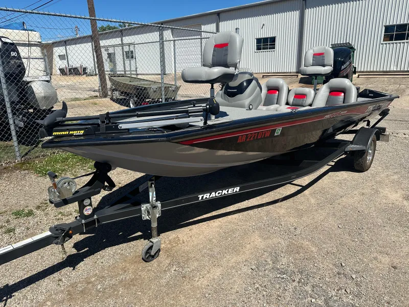 Slide: The Image of 2017 Tracker Pro Team 175 TXW fishing boat on trailer, parked outdoors. - 3