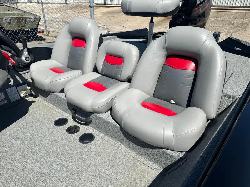 Slide: The Image of 2017 Tracker Pro Team 175 TXW boat seats with gray and red upholstery. - 5