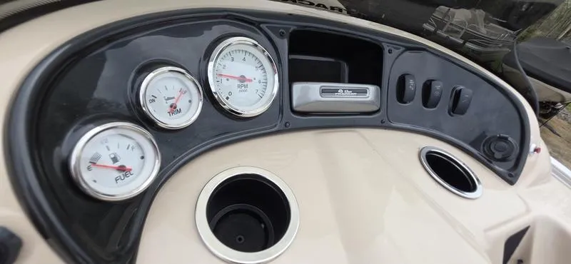 Slide: The Image of Dashboard of 2017 Sun Tracker Party Barge 18 DLX with gauges and controls. - 12