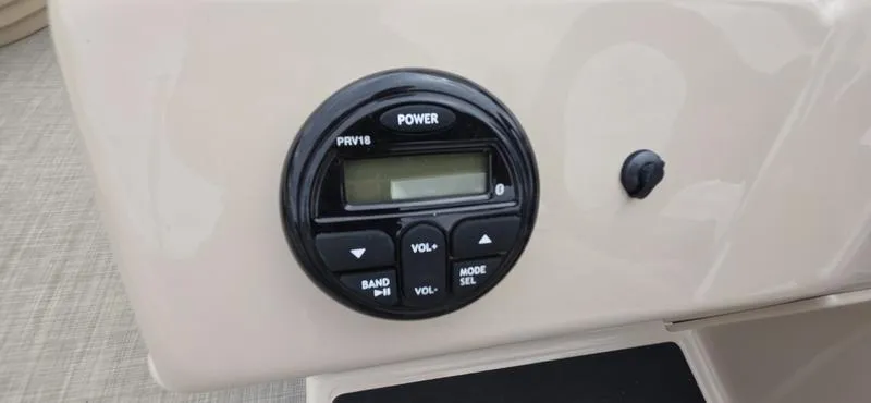 Slide: The Image of Control panel on a 2017 Sun Tracker Party Barge 18 DLX boat. - 13