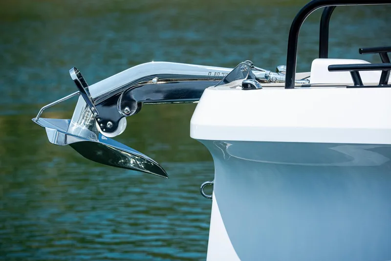Slide: The Image of 2025 Axopar 45 XC Cross Cabin boat anchor detail on water. - 14