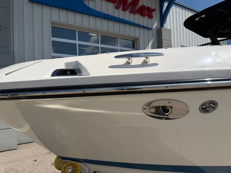 Slide: The Image of The 2026 Sea Ray SLX 260 features a sleek design with shiny chrome accents. - 15