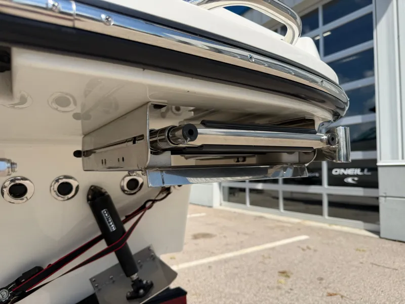 Slide: The Image of Close-up of the stern of a Sea Ray SLX 260 boat with stainless steel components. - 18