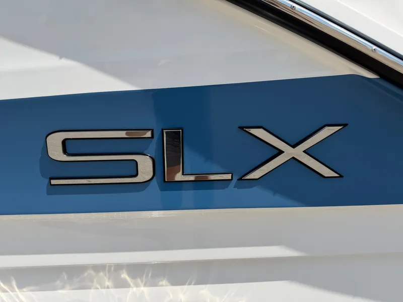 Slide: The Image of Close-up of the "SLX" lettering on a Sea Ray SLX 260 boat. - 16