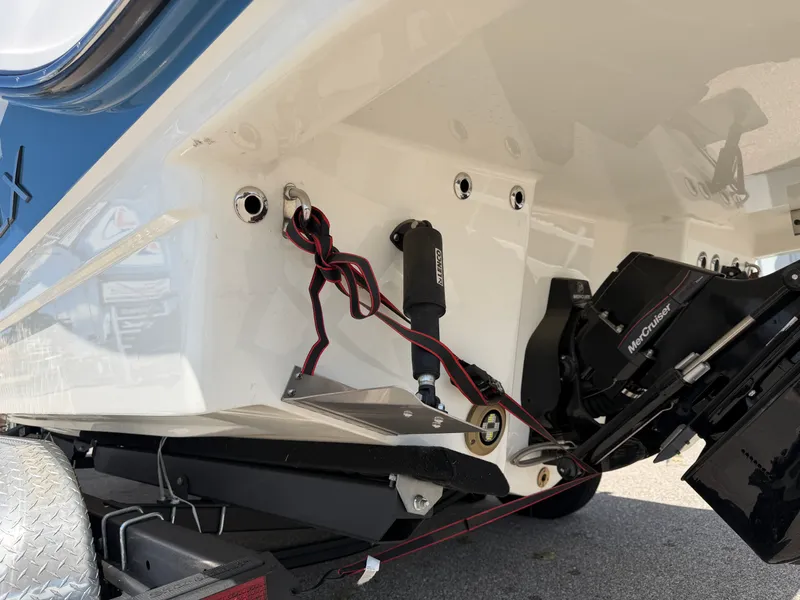 Slide: The Image of Close-up of the stern of a Sea Ray SLX 260 boat with engine and wiring. - 14