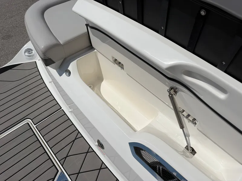 Slide: The Image of Storage compartment in the rear area of the 2026 Sea Ray SLX 260. - 26