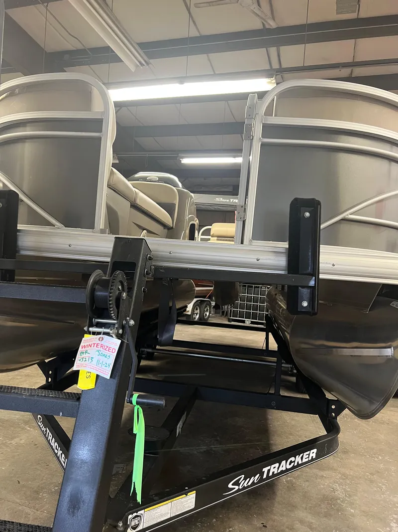 Slide: The Image of 2020 Sun Tracker Party Barge 20 DLX pontoon boat on trailer in indoor storage. - 7