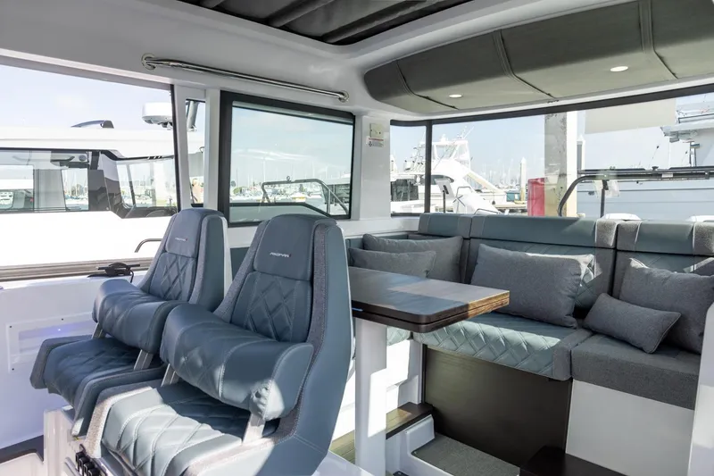 Slide: The Image of 2023 Axopar 37 XC Cross Cabin interior with BRABUS trim and wet bar. - 16