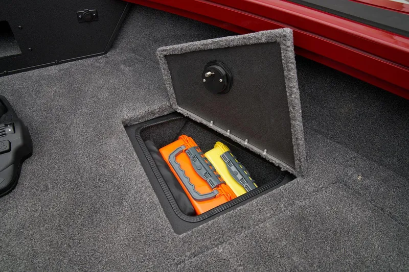 Slide: The Image of Open storage compartment in 2025 Tracker Targa V-19 Combo boat. - 26
