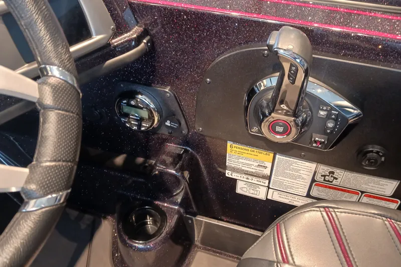 Slide: The Image of 2025 Nitro ZV20 boat dashboard with steering wheel and control panel. - 7