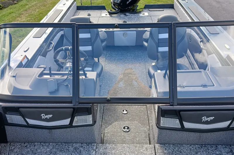 Slide: The Image of 2025 Ranger VX1888 WT boat interior with seating and steering wheel. - 5