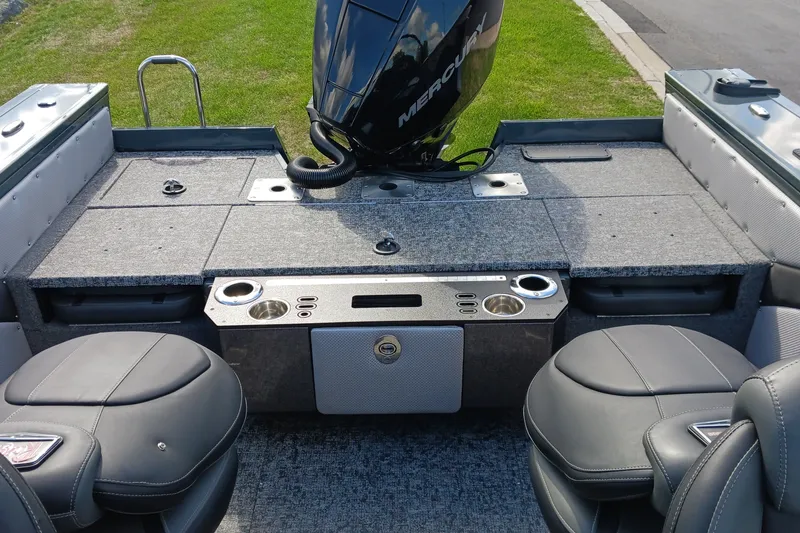 Slide: The Image of 2025 Ranger VX1888 WT boat interior with seating and motor, featuring modern design elements. - 8