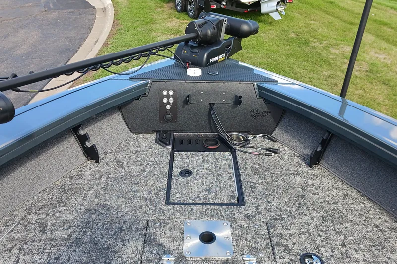 Slide: The Image of 2025 Ranger VX1888 WT boat interior with advanced control panel and trolling motor. - 4