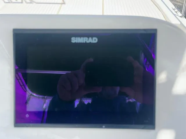 Slide: The Image of Simrad display on 2016 Carolina Skiff 218 DLV boat dashboard. - 6