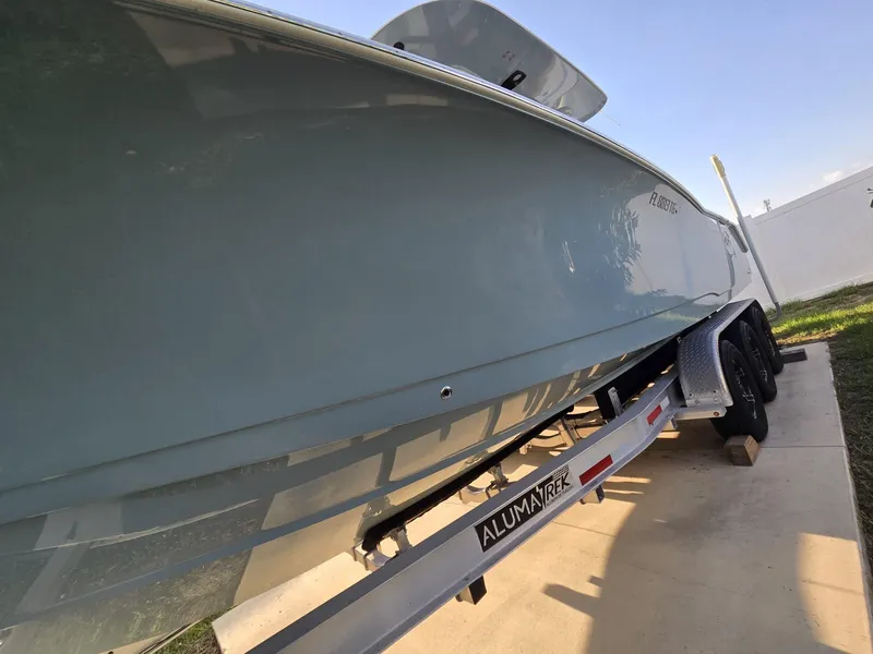 Slide: The Image of 2022 Sea Hunt Gamefish 30 on trailer, side view, outdoors. - 16