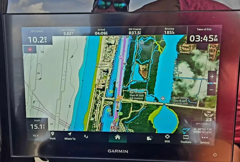 Slide: The Image of Garmin GPS display on 2022 Sea Hunt Gamefish 30, showing navigation map and data. - 27