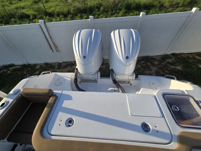 Slide: The Image of 2022 Sea Hunt Gamefish 30 with dual outboard engines, viewed from above. - 5