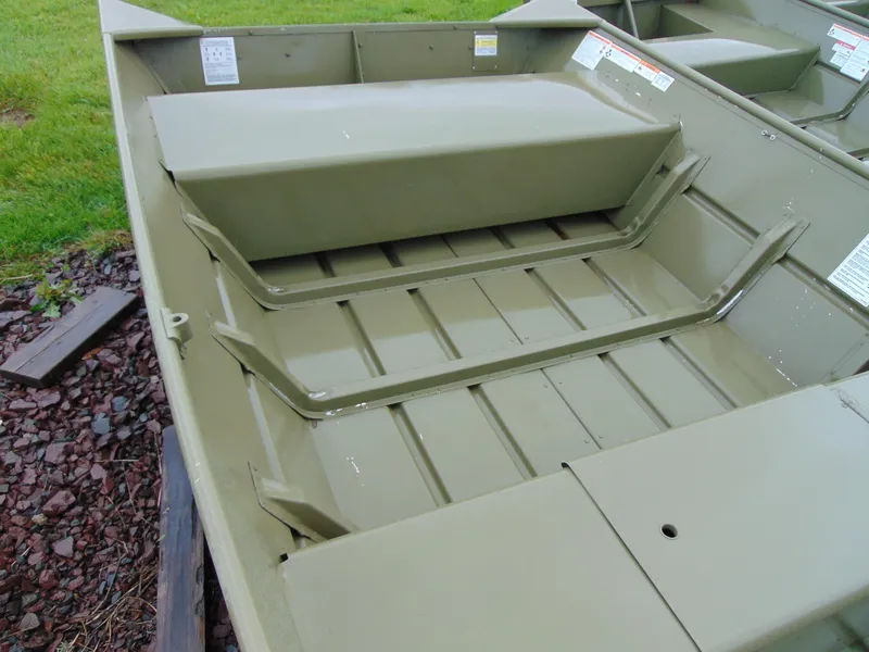 Slide: The Image of 2024 Crestliner 1448M CR Jon boat interior, showcasing seating and storage areas. - 10