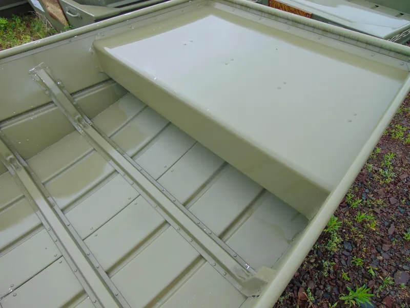 Slide: The Image of 2024 Crestliner 1448M CR Jon boat interior, showcasing durable aluminum construction. - 9