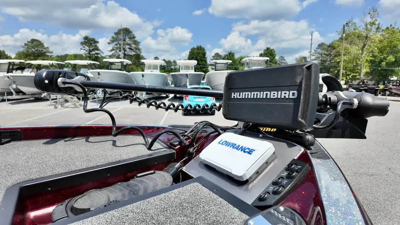 Slide: The Image of 2018 Ranger Z 518c boat with Humminbird and Lowrance electronics, parked outdoors. - 13