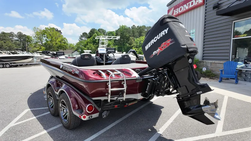 Slide: The Image of 2018 Ranger Z 518c boat with Mercury engine parked outside dealership. - 16