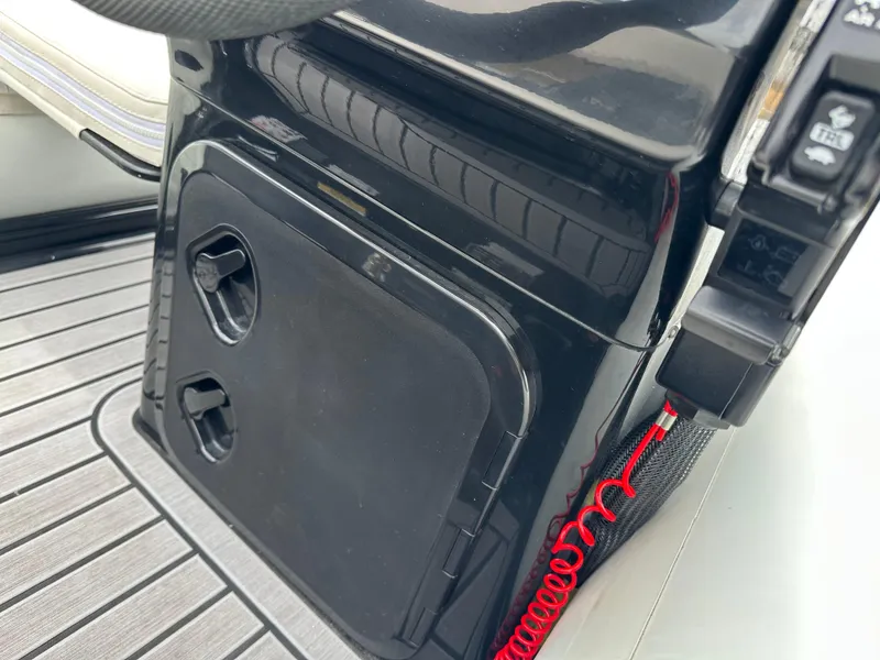 Slide: The Image of Control panel of a 2022 Grand Inflatables G380 boat with safety features. - 12