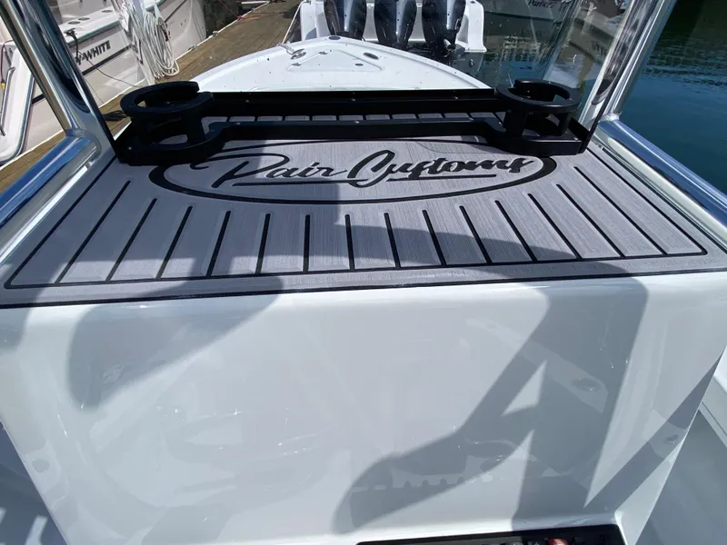 Slide: The Image of 2023 Pair Customs 21 Center Console DV boat with branded deck mat. - 10