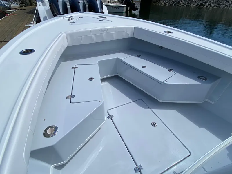 Slide: The Image of 2023 Pair Customs 21 Center Console DV boat with spacious seating and storage compartments. - 17