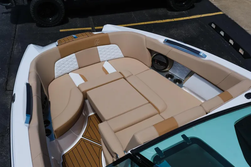 Slide: The Image of 2025 MasterCraft X26 boat interior with luxurious tan seating and modern design. - 31