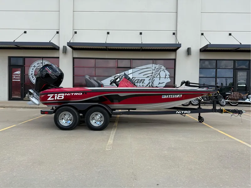 Slide: The Image of 2020 Nitro Z18 Pro boat on trailer, parked outside dealership. - 1