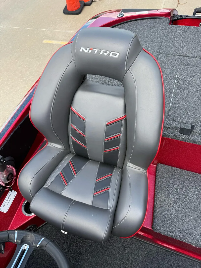 Slide: The Image of Nitro Z18 Pro 2020 boat seat with gray and red accents, showcasing sleek design. - 19