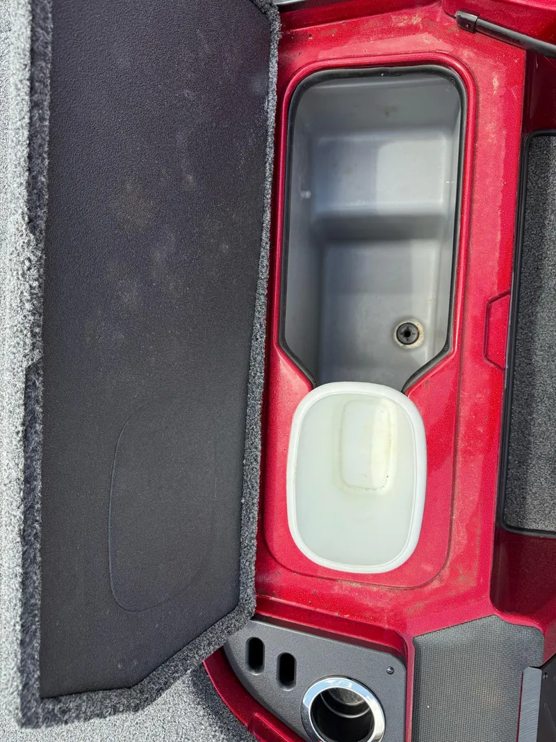 Slide: The Image of Open storage compartment in a 2020 Nitro Z18 Pro boat. - 21
