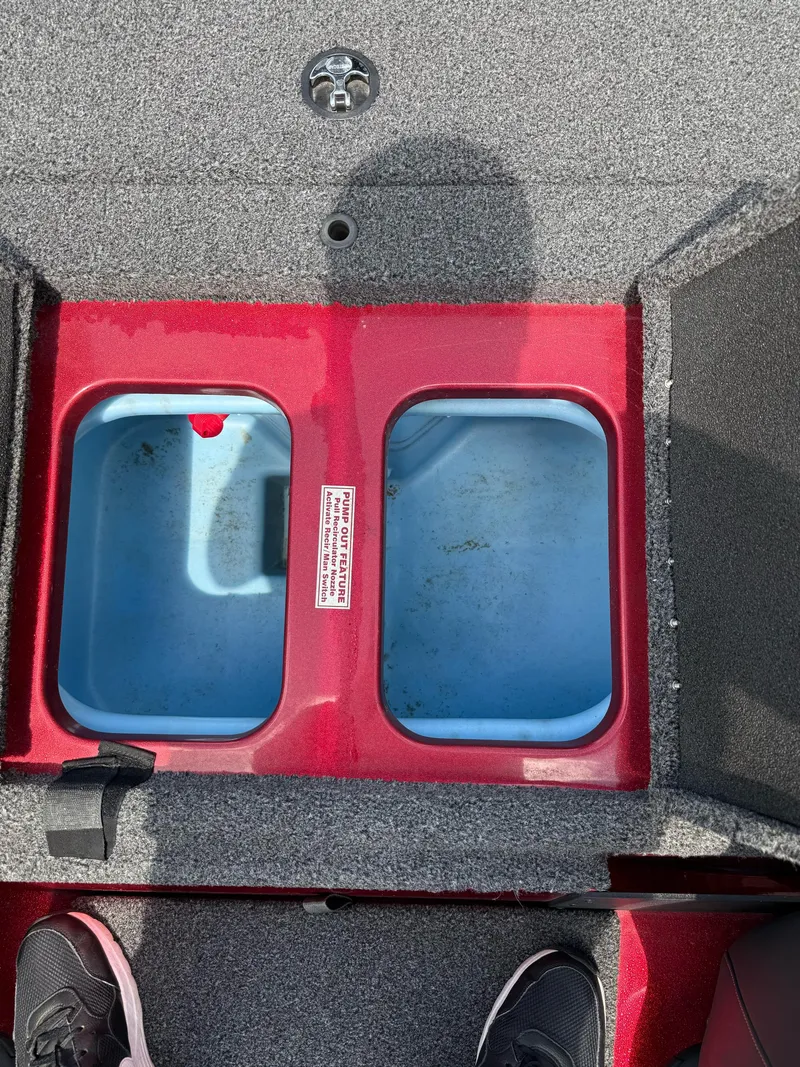 Slide: The Image of Livewell compartments in a 2020 Nitro Z18 Pro boat, featuring red and blue interior. - 22