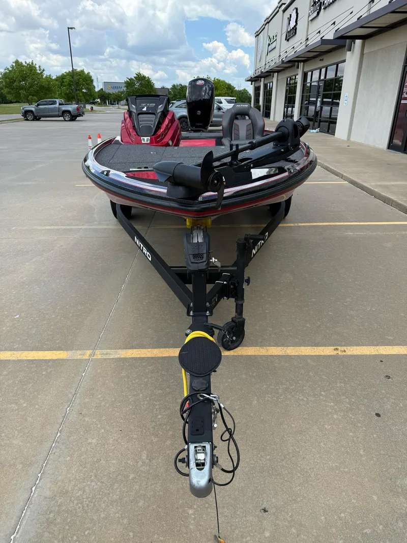 Slide: The Image of 2020 Nitro Z18 Pro boat parked on concrete near a building. - 3