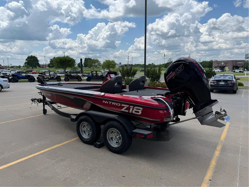 Slide: The Image of 2020 Nitro Z18 Pro boat in parking lot under cloudy sky. - 6