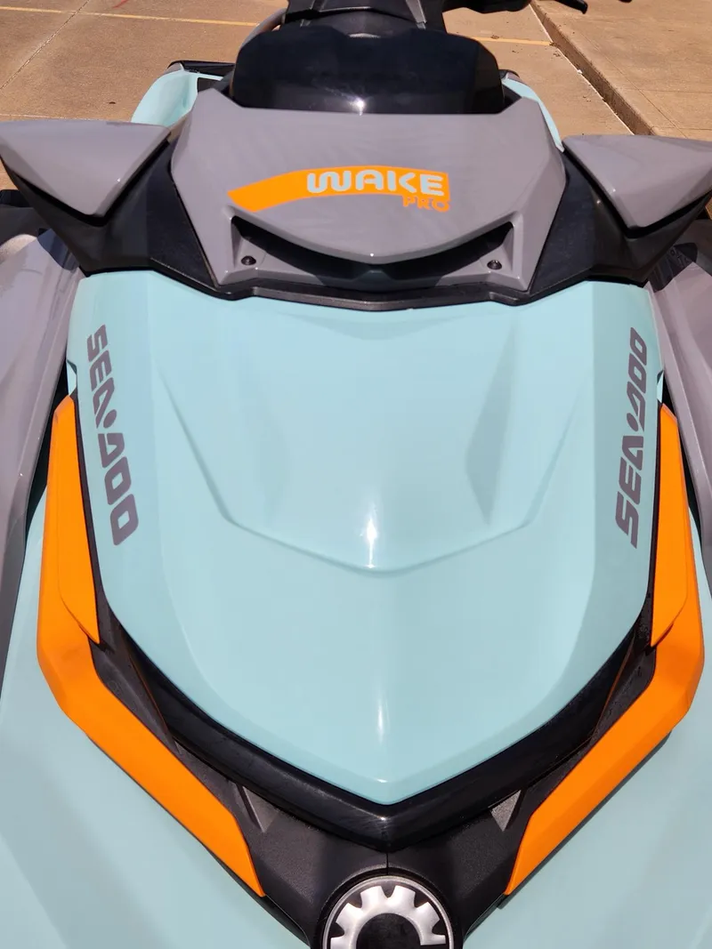 Slide: The Image of 2022 Sea-Doo Wake Pro 230 jet ski, close-up of front design and logo. - 13