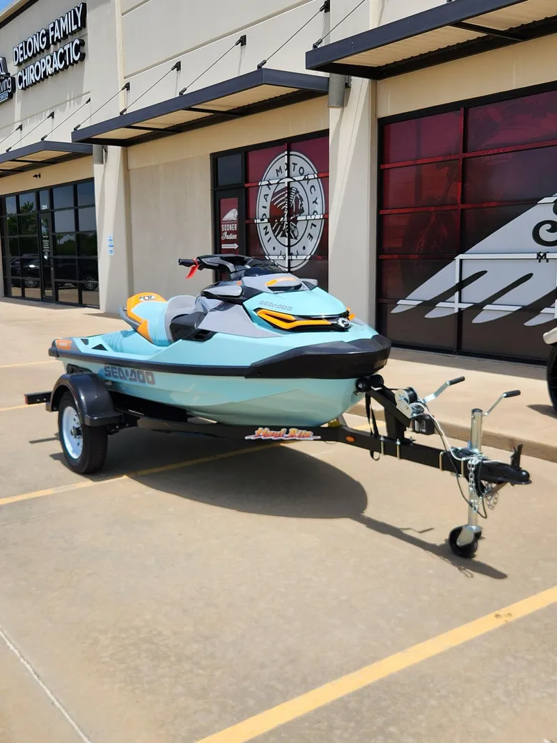 Slide: The Image of 2022 Sea-Doo Wake Pro 230 on trailer outside a building. - 2