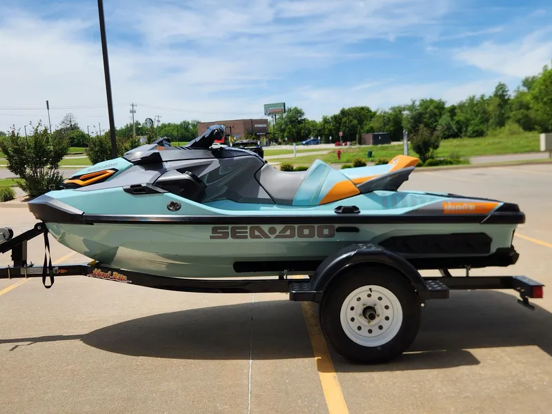 Slide: The Image of 2022 Sea-Doo Wake Pro 230 on trailer, parked outdoors, sunny day. - 5