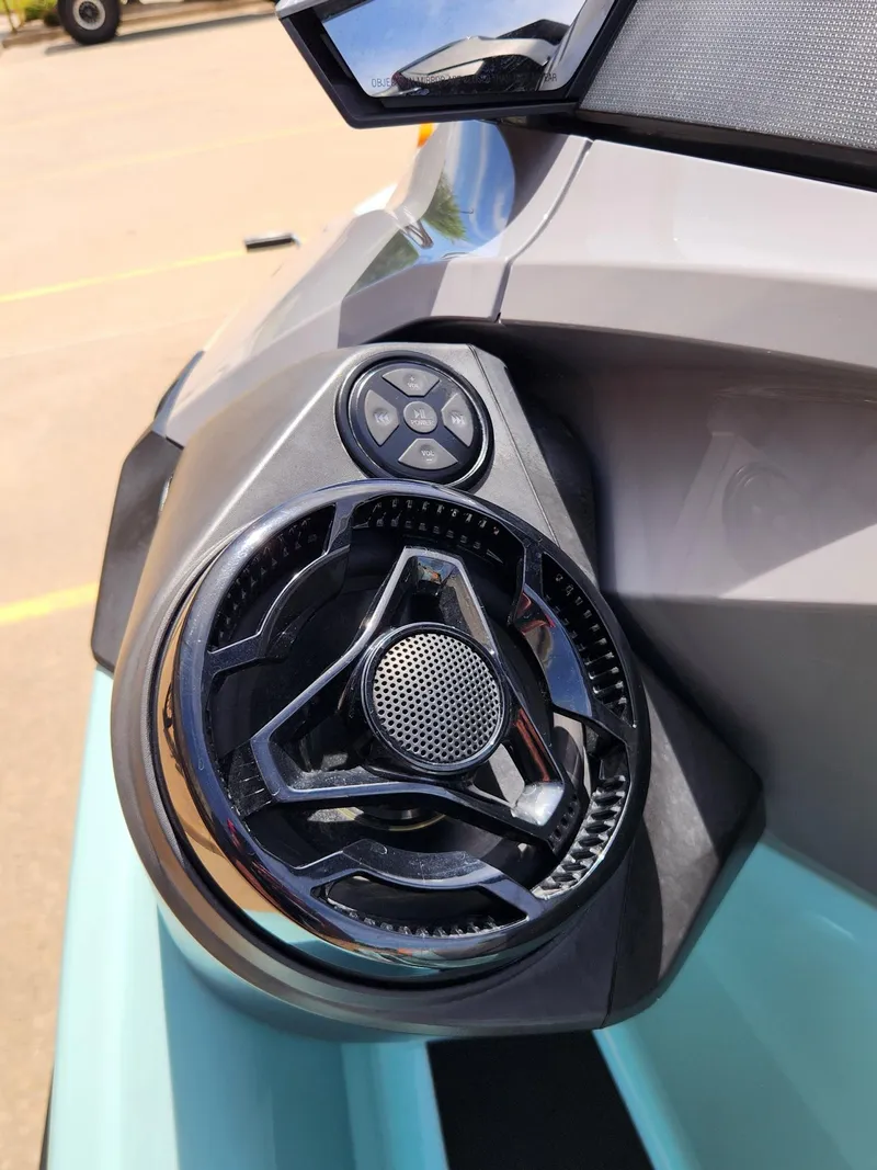Slide: The Image of Close-up of 2022 Sea-Doo Wake Pro 230 speaker and control panel. - 9