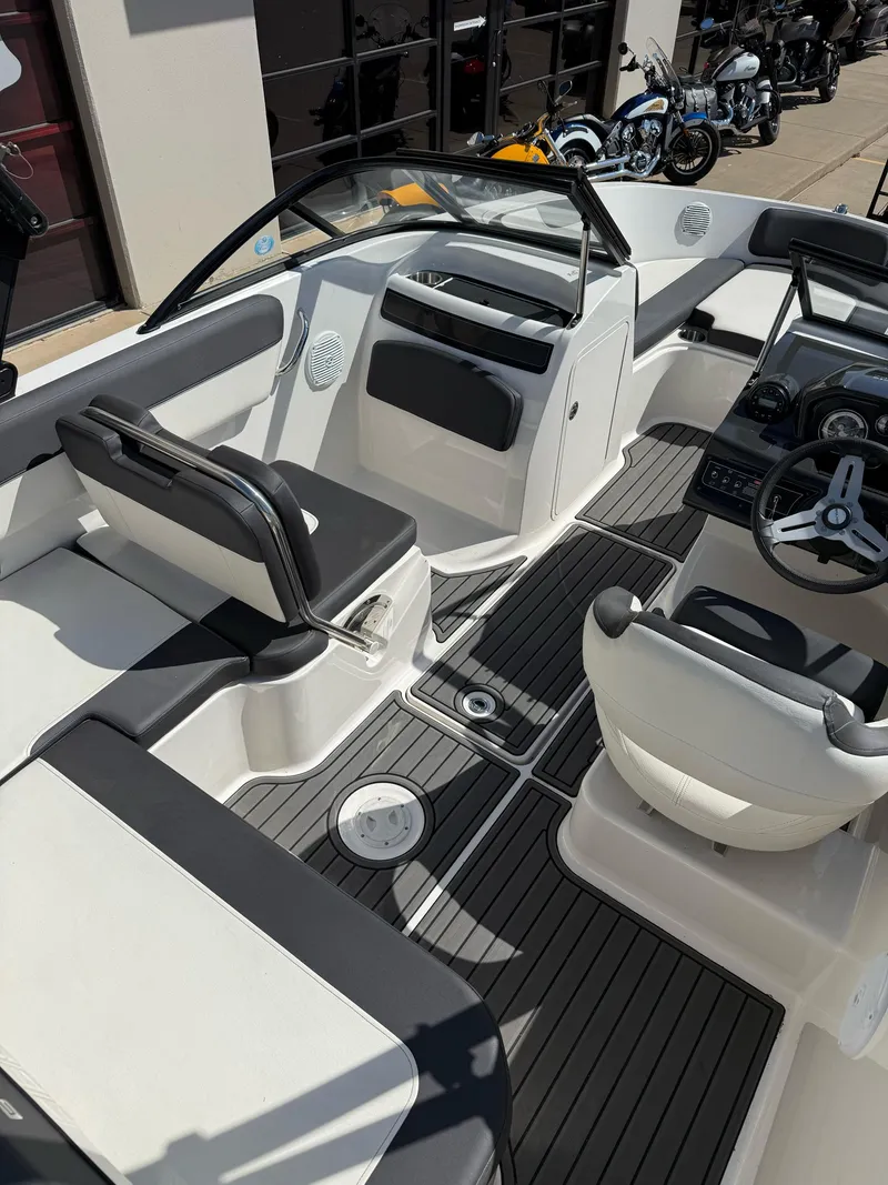 Slide: The Image of 2021 Bayliner VR5 Bowrider I/O interior with sleek seating and modern dashboard. - 12