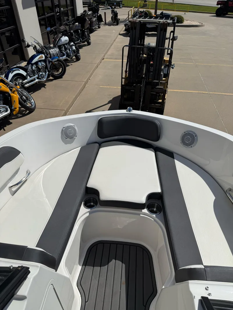 Slide: The Image of 2021 Bayliner VR5 Bowrider I/O boat interior with seating and cup holders. - 18